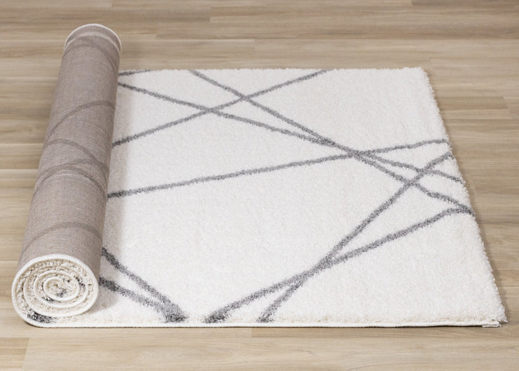 Alfombra peluda Fergus White Grey Lines Crossing de Kalora Interiors