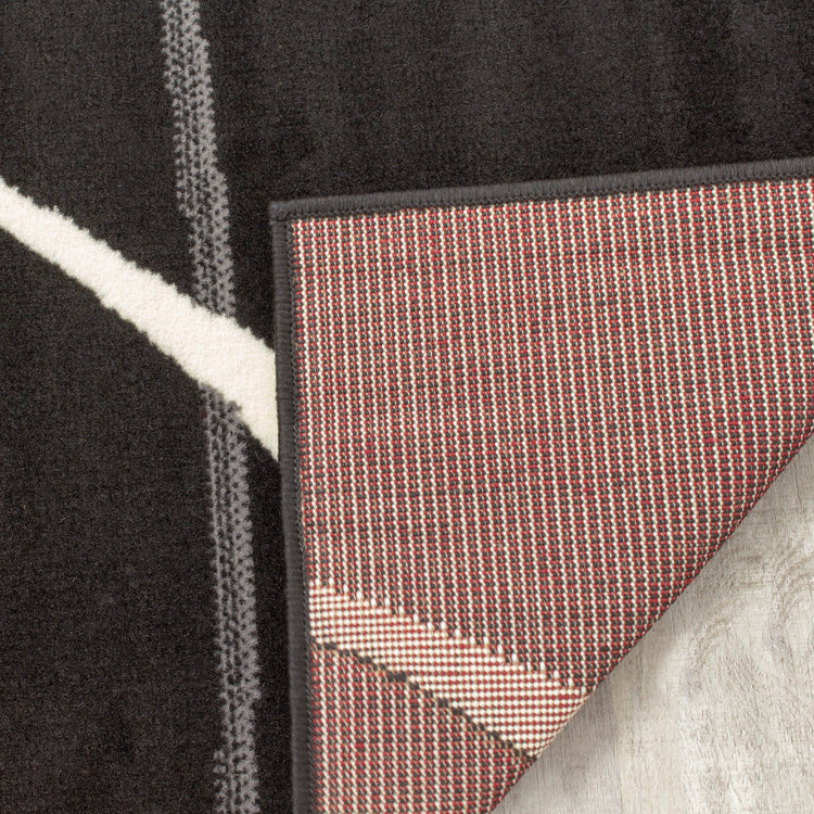 Fiona 5015_1945 Alfombra de área con tallas Swoop en negro, blanco y rojo de Novelle Home