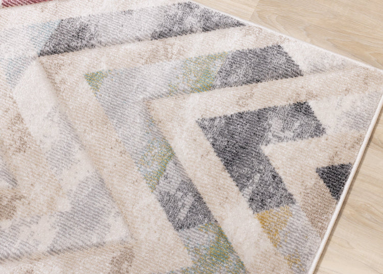 Folio Cream Grey Blue Pink Yellow Distressed Carved Chevron Rug by Kalora Interiors