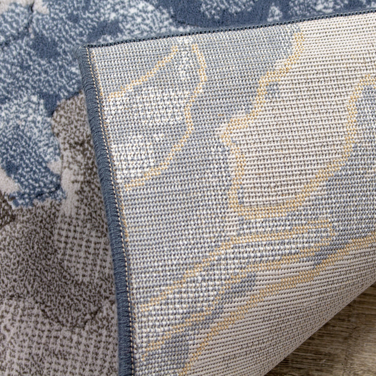 Alfombra Intrigue Rushing Water en beige/azul/crema de Kalora Interiors