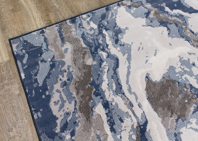 Alfombra Intrigue Rushing Water en beige/azul/crema de Kalora Interiors