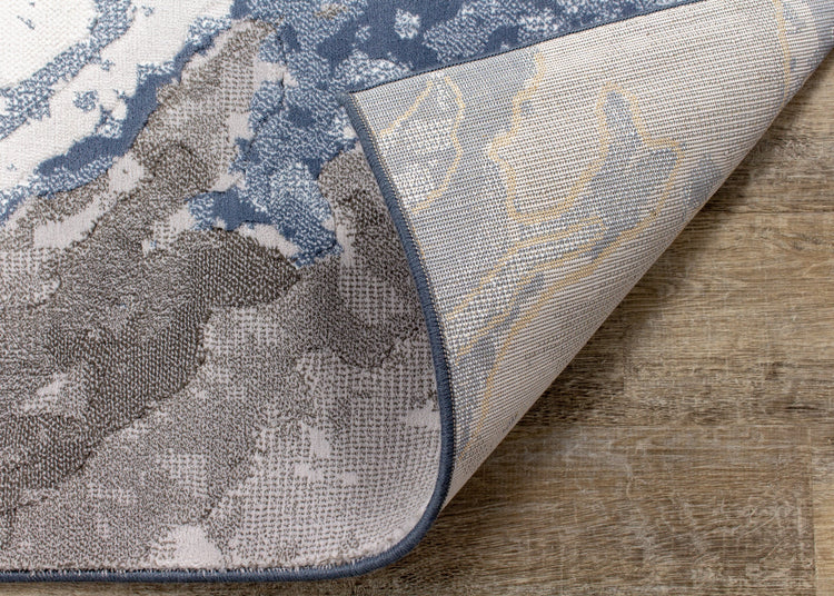 Alfombra Intrigue Rushing Water en beige/azul/crema de Kalora Interiors