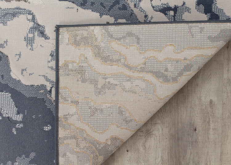 Alfombra Intrigue Rushing Water en beige/azul/crema de Kalora Interiors