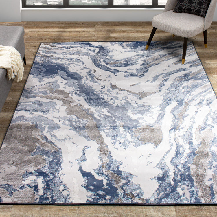 Alfombra Intrigue Rushing Water en beige/azul/crema de Kalora Interiors