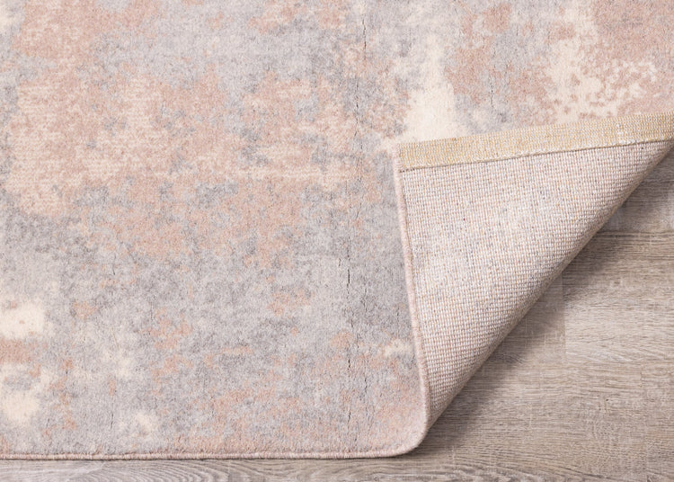 Alfombra nórdica gris rosa crema desgastada de Kalora Interiors