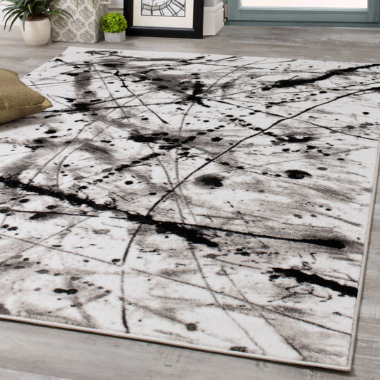 Novelle Home Paladin 3368_28 - Alfombra negra y gris con gotas de pintura y líneas