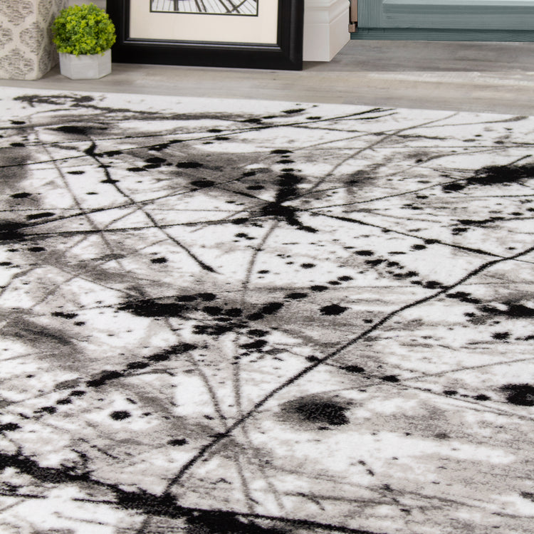Novelle Home Paladin 3368_28 - Alfombra negra y gris con gotas de pintura y líneas