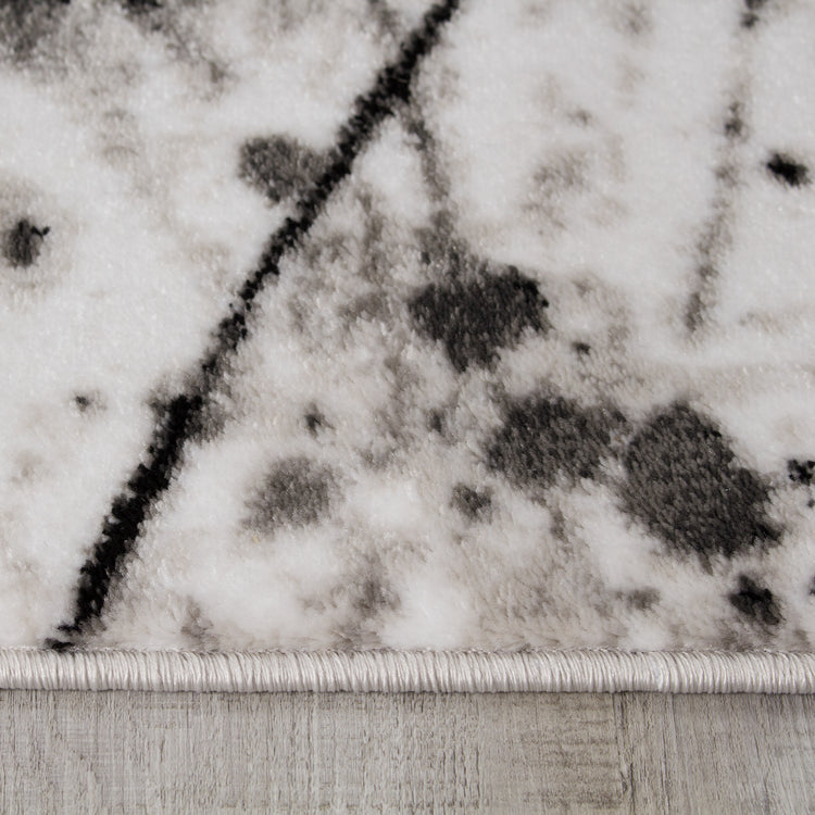 Novelle Home Paladin 3368_28 - Alfombra negra y gris con gotas de pintura y líneas