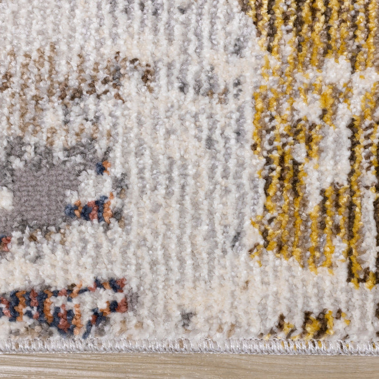 Evora Cream Blue Red Yellow Opposing Triangles Distressed Rug by Kalora Interiors