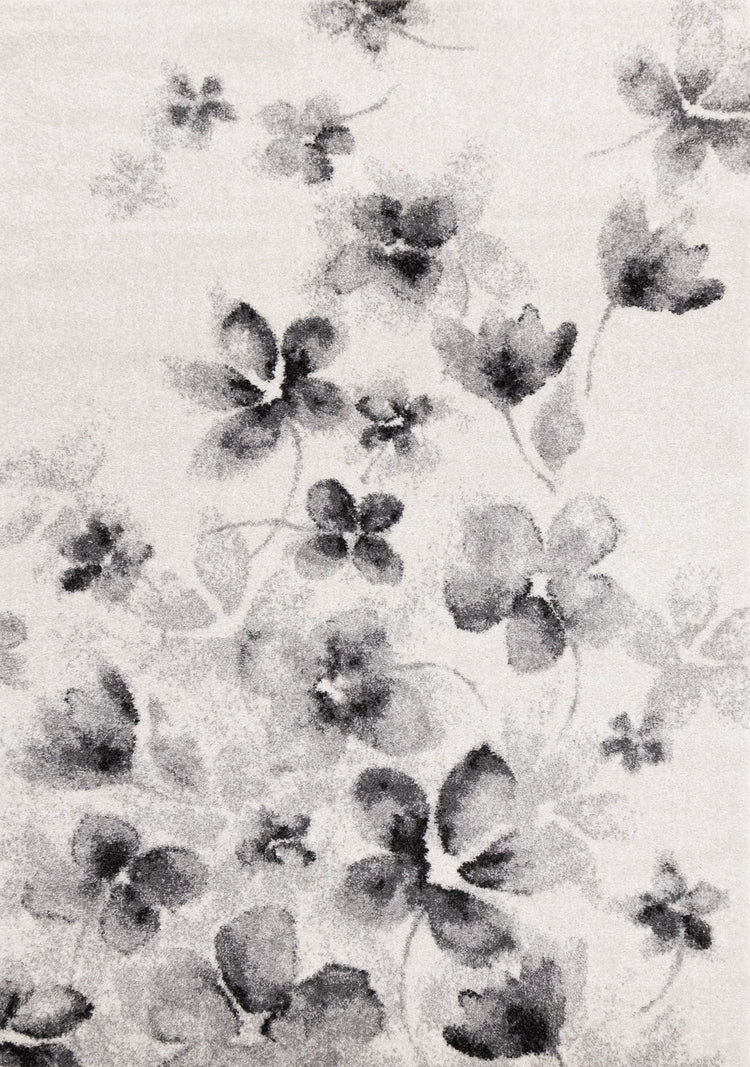 Alfombra botánica Focus en blanco y gris de Kalora Interiors