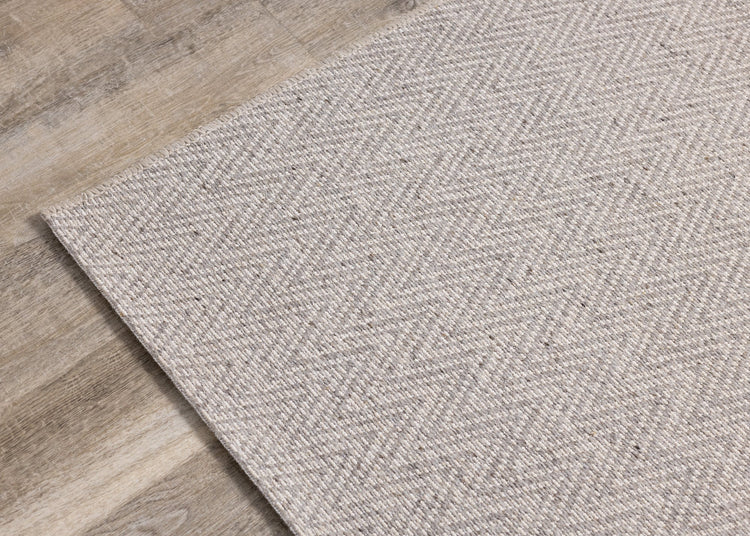 Peak Grey Chevron Textured Flatweave Rug by Kalora Interiors